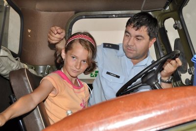 A pupil with an instructor in the radio aviation cabin